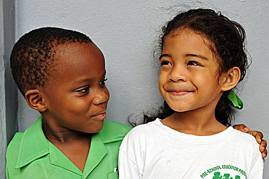 dominica,roseau,preschool,social,center,portrait,of,young,girl,and,boy