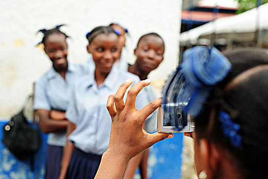 haiti,croix,des,bouquets,girl,taking,photograph