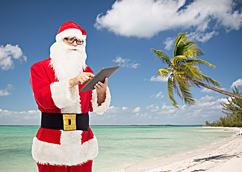圣诞节,休假,科技,旅行,人,概念,男人,服饰,圣诞老人,平板电脑,电脑,上方,热带沙滩,背景