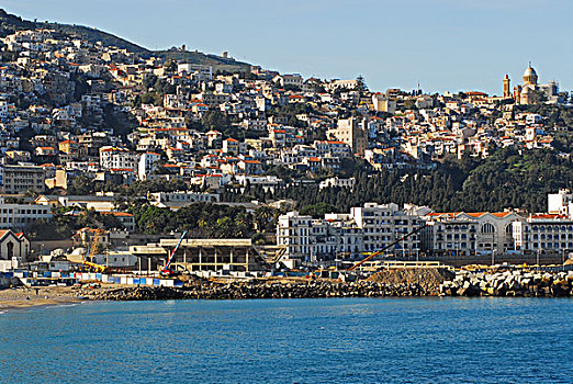 algeria,alger,aerial,view,of,congested,buildings,in,the,city,with,church,background