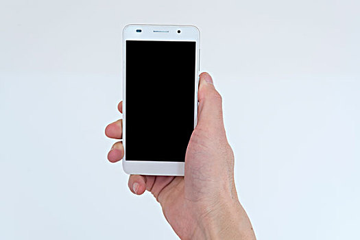 手拿着智能手机在白色的背景上