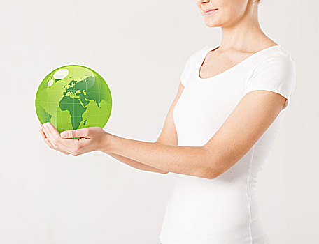 特写,女人,拿着,绿色,球体,地球