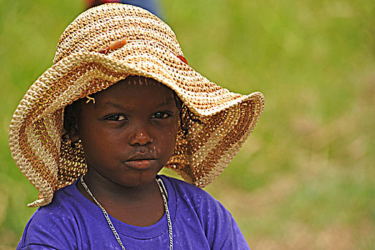 dominica,carib,territory,portrait,of,little,girl,with,a,straw,hat