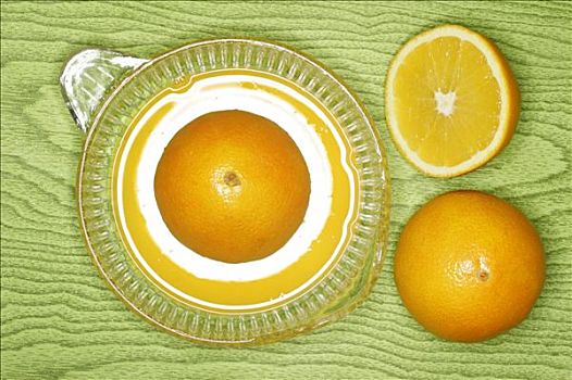 橘子,柠檬榨汁器,绿色,木质背景