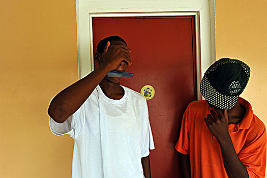 dominica,roseau,juveniles,prison,social,center,two,teenagers,masking,their,face