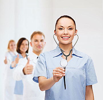 医药健康,概念,微笑,女医生,护理,听诊器,团队,背影,展示,竖大拇指