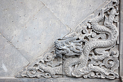 北京颐和园里砖刻龙浮雕