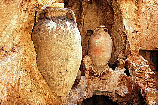 libya,nalut,old,jars,embedded,in,rock