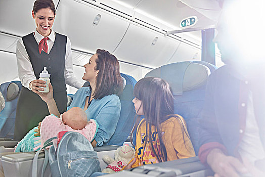 微笑,空乘人员,奶瓶,飞机