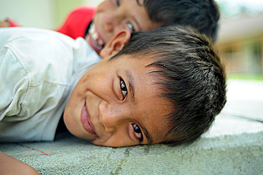 indonesia,sumatra,banda,aceh,portrait,of,2,young,boys,smiling