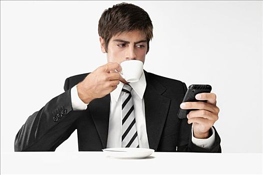 商务人士,手机,喝咖啡