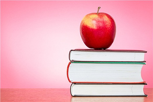 书本,苹果,粉色背景