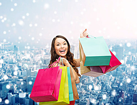 销售,礼物,圣诞节,休假,人,概念,微笑,女人,彩色,购物袋,上方,雪,城市,背景