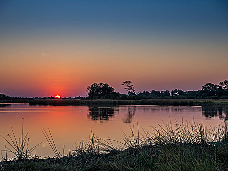 日落,奥卡万戈三角洲,博茨瓦纳,非洲