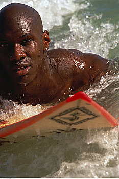 特写,男人,冲浪板,水中