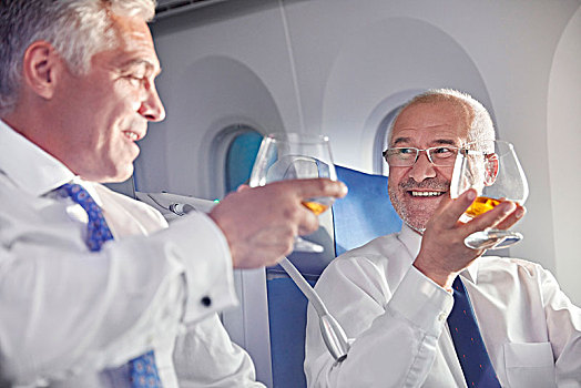 商务人士,祝酒,威士忌酒杯,第一,飞机