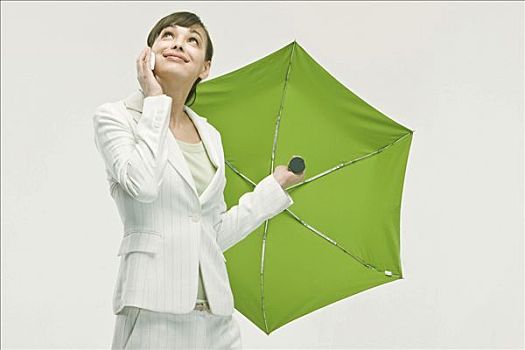 职业女性,打手机,拿着,伞