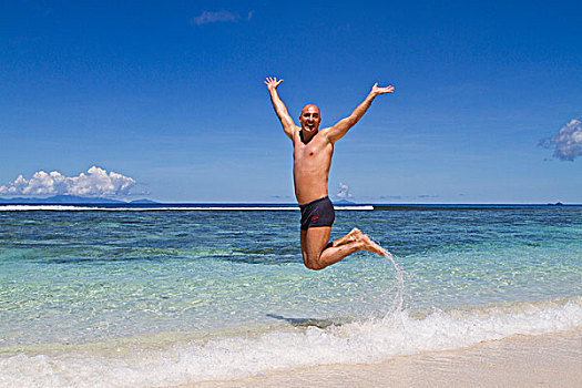 男人,45岁,跳跃,海滩,拉迪格岛,塞舌尔,非洲,印度洋