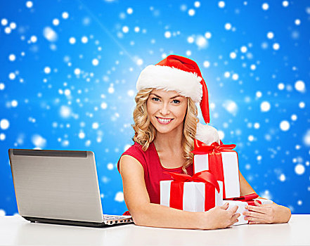圣诞节,休假,科技,人,概念,微笑,女人,圣诞老人,帽子,礼物,笔记本电脑,上方,蓝色,雪,背景