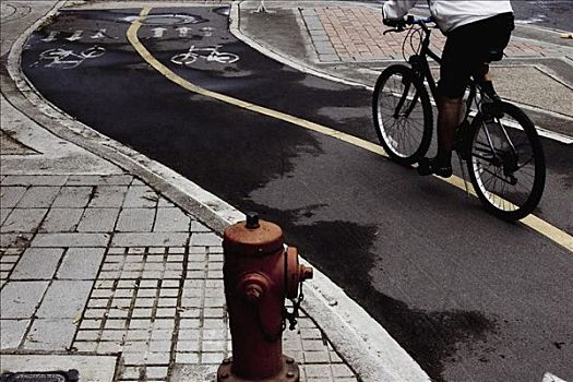 特写,消防栓,一个人,骑自行车,旁侧