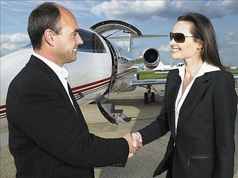 商务人士,职业女性,握手,正面,私人飞机