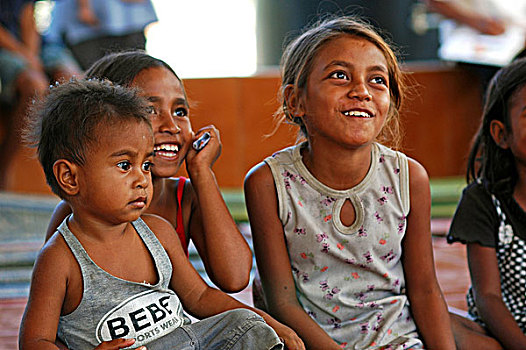 group,of,timorese,children,with,plastic,glasses,water