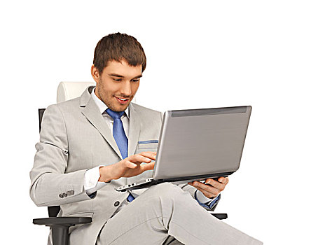 年轻,商务人士,坐,椅子,笔记本电脑