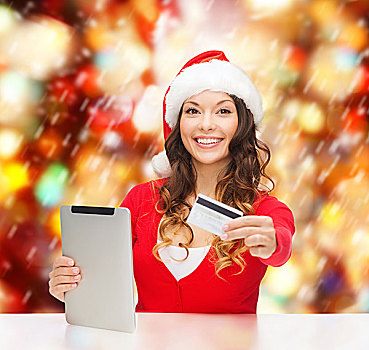 圣诞节,圣诞,网上购物,概念,女人,圣诞老人,帽子,礼盒,平板电脑,电脑,信用卡