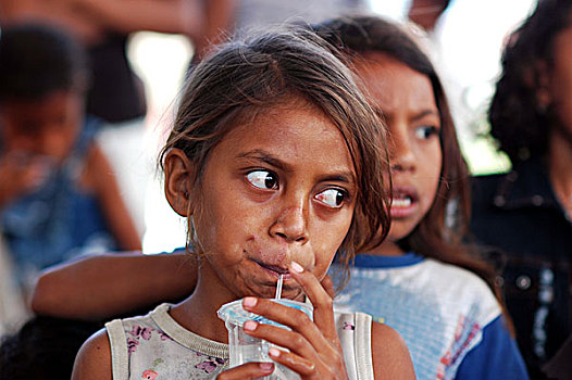 portrait,of,timorese,boy,taking,pictures