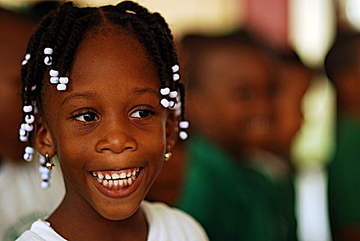 dominica,roseau,preschool,social,center,portait,of,girl,with,braids