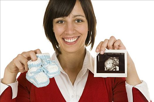 女人,拿着,婴儿鞋,超声波扫描图