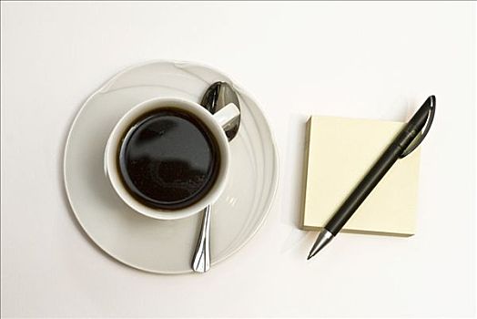 咖啡杯,记事本,圆珠笔