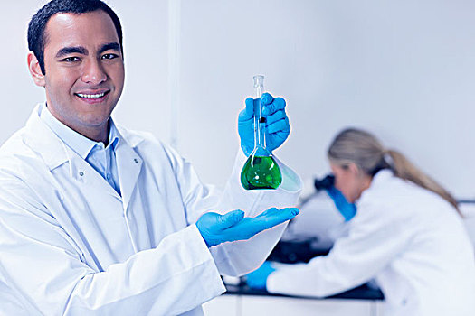 科学,学生,拿着,绿色,化学品,烧杯