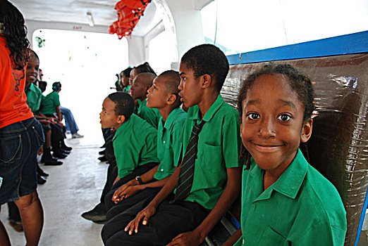 dominica,roseau,schoolchildren,excited,in,the,boat,during,unicef,-,environmental,network,whalewatching