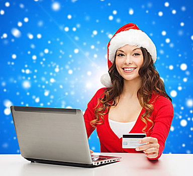 圣诞节,休假,科技,购物,概念,微笑,女人,圣诞老人,帽子,信用卡,笔记本电脑,上方,蓝色,雪,背景