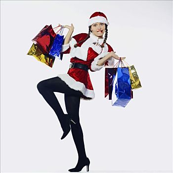 女人,装扮,圣诞老人,姿势,购物袋