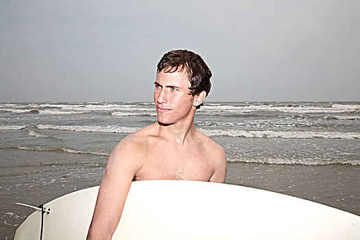 男人,拿着,冲浪板,加尔维斯顿,岛屿,德克萨斯,美国