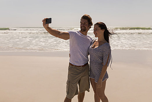 浪漫,高兴,年轻,情侣,手机,海滩