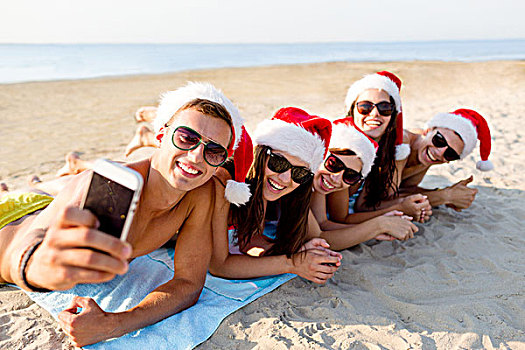 友谊,暑假,休假,科技,人,概念,群体,朋友,圣诞老人,帽子,智能手机,海滩