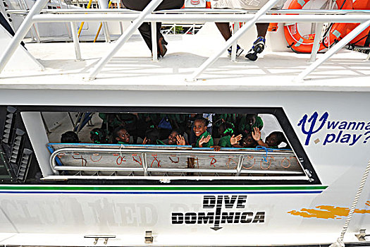 dominica,roseau,schoolchildren,embarking,for,whales,and,dolphin,tour,part,of,the,unicef,-,environmental,network,whalewatching