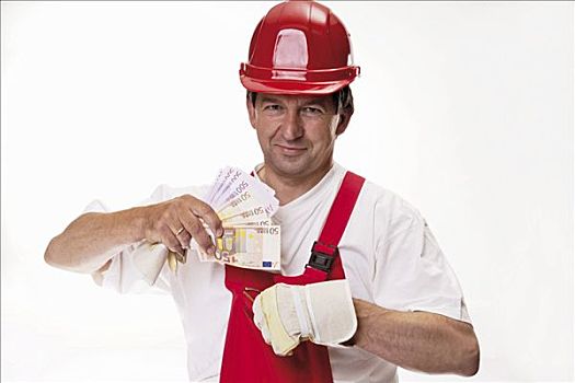 技工,穿,红色,安全帽,拿着,欧元钞票,扇形展开,手
