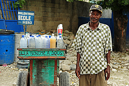 haiti,croix,des,bouquets,portrait,of,man,cutting,ice