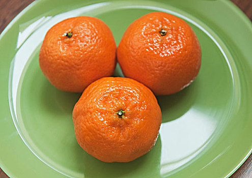 三个,橘子,盘子,棚拍