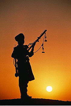 剪影,男人,乐器,日落,印度