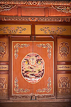 甘肃敦煌民俗博物馆展示的民居建筑物壁画龙图案