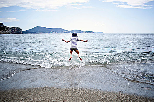 小男孩,跳跃,海洋