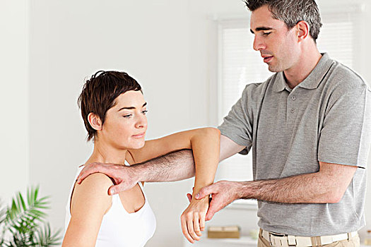 脊椎按摩师,伸展,女人,手臂