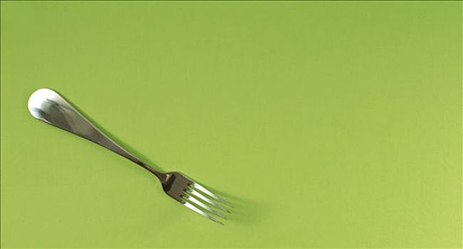 叉子,绿色背景