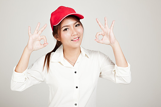 高兴,亚洲人,女孩,展示,ok,手势,红色,帽子,灰色背景