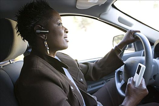 女人,驾驶,mp3播放器,手机,听筒
